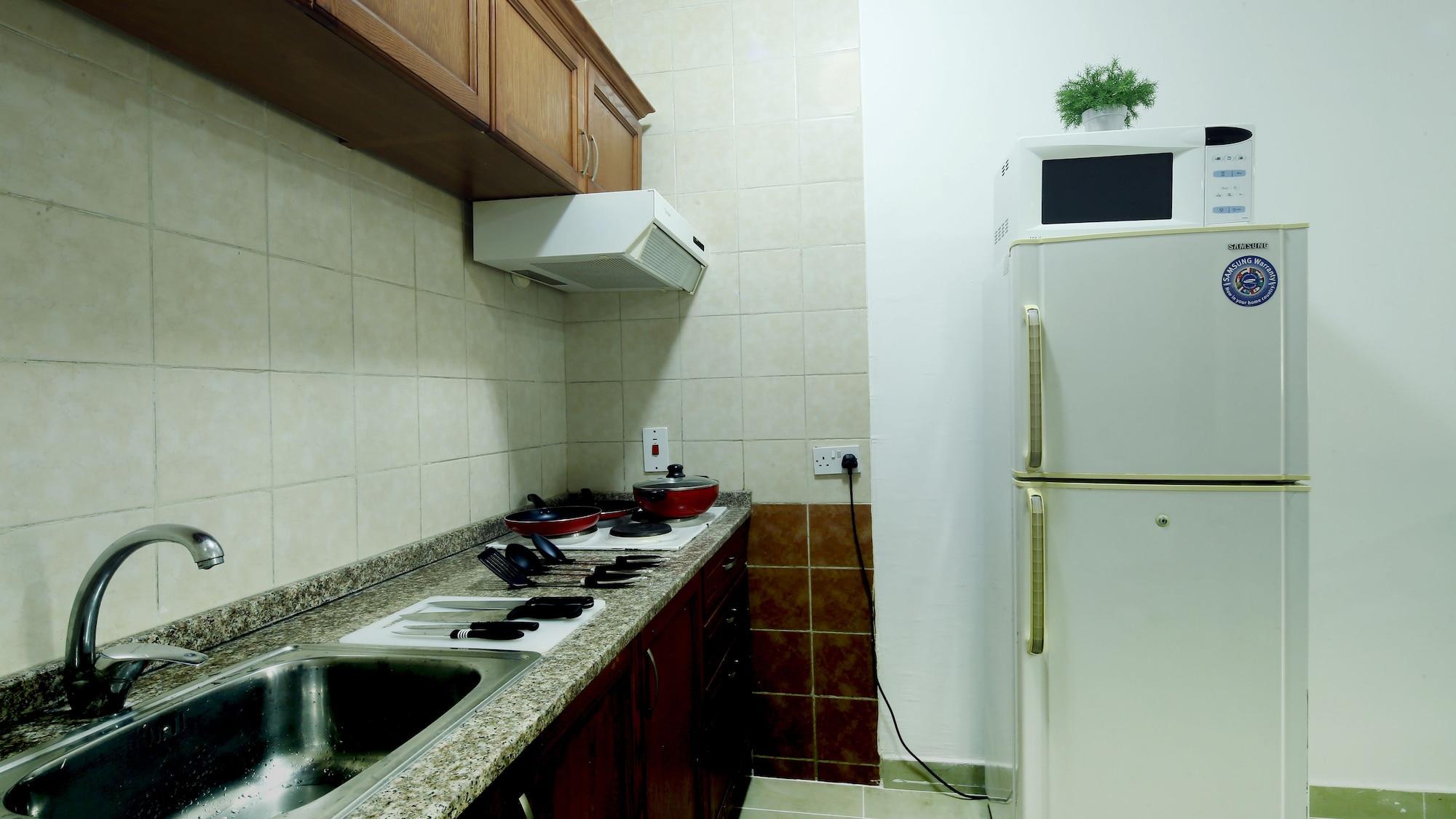 La Villa Inn Hotel Apartments Доха Екстериор снимка