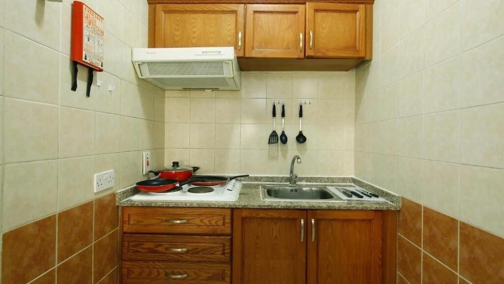 La Villa Inn Hotel Apartments Доха Екстериор снимка